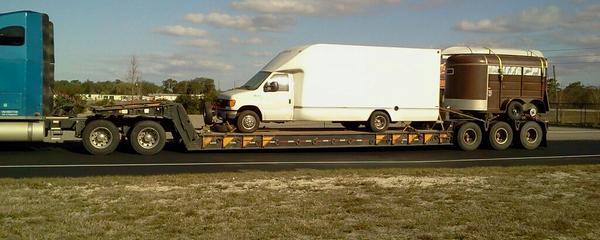 Truck and Trailer on Lowboy Trailer truck transport photo