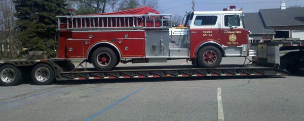 fire truck on trailer 102 truck transport photo